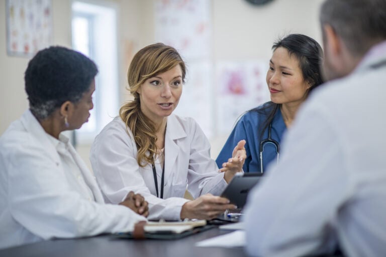 Doctor With A Tablet